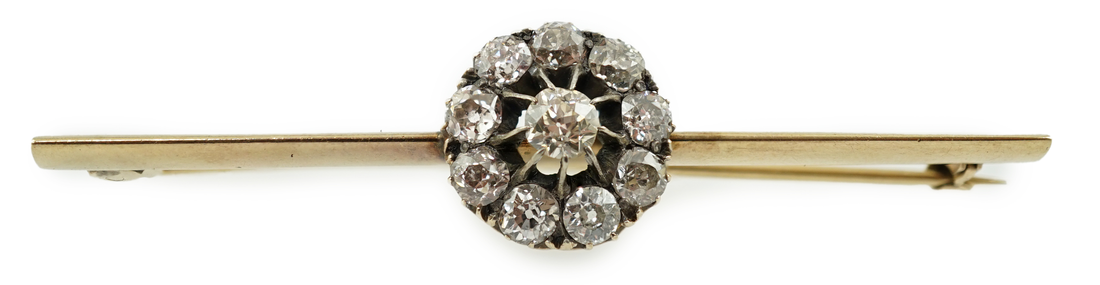 An Edwardian gold and circular diamond cluster bar brooch